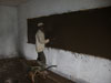 The blackboard is plastered on